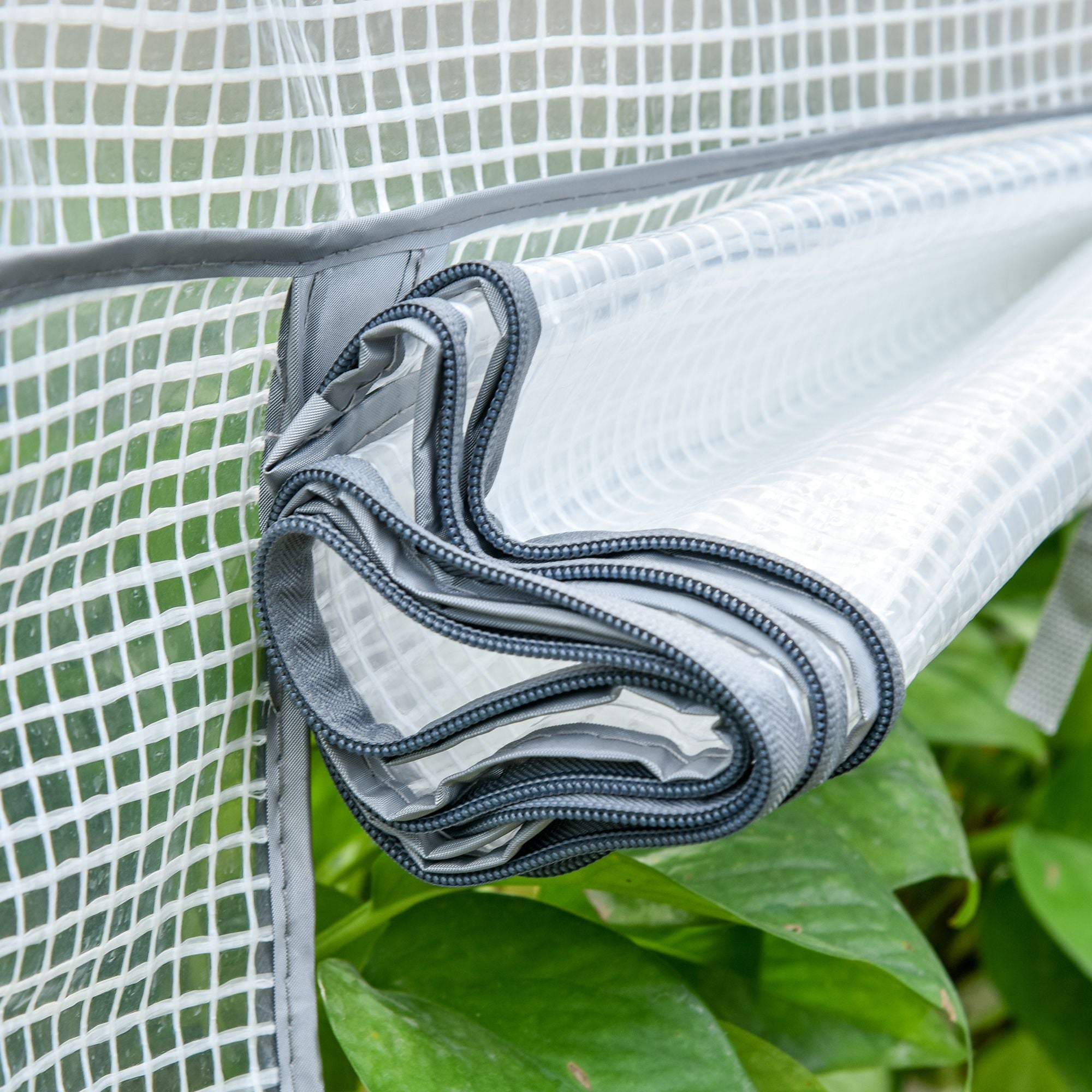 Rolled-up translucent white pe mesh cover with gray reinforced edges for outsunny portable greenhouse with powder coated steel frame