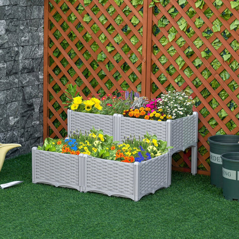 Gray plastic wicker-style planter box with two tiers 40l x 40w filled with colorful flowers and greenery