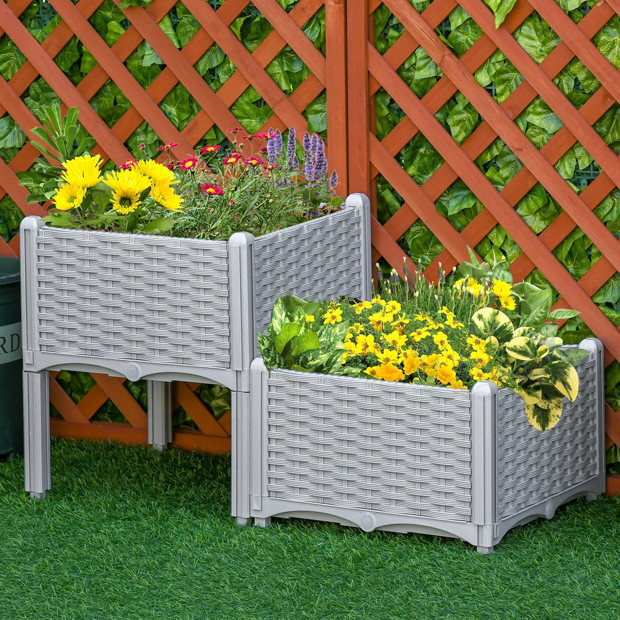 Outsunny grey woven plastic planter box 40l x 40w with lattice design and sturdy legs filled with yellow flowers