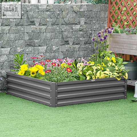 Dark gray galvanised steel raised garden bed with direct contact soil, filled with colorful flowers and greenery
