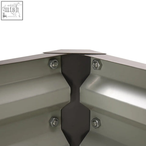 Dark gray metal corner bracket with four silver bolts securing the galvanised steel frame of outsunny garden bed box
