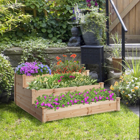 Outsunny 470l wooden raised bed with three-tier stepped design and colorful flowers for garden yard and patio use
