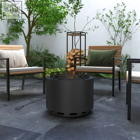 Outsunny black metal smokeless wood burning firepit with high heat resistance and visible flames inside