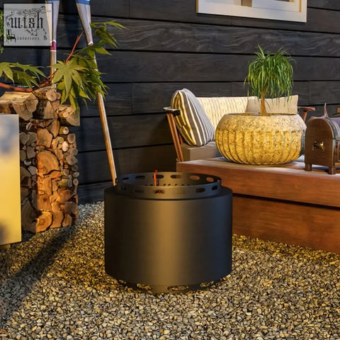 Outsunny 48.5cm black metal smokeless wood burning firepit with high heat resistance and perforated top for safety