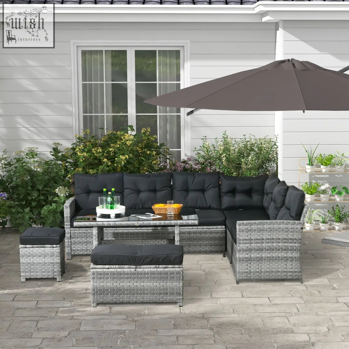 Gray woven wicker outdoor sectional sofa set with powder coated steel frame, black cushions, coffee table, and two three-seater sofas