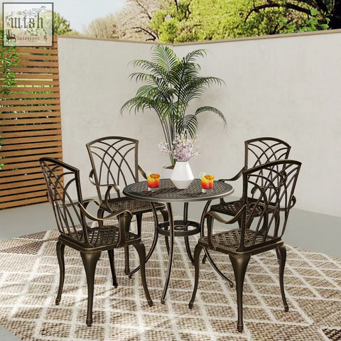 Bronze cast aluminium garden furniture set with intricate lattice backrests and woven seat patterns for outdoor dining