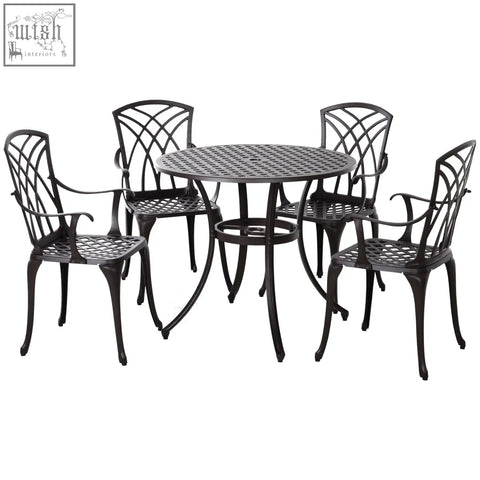 Black wrought iron cast aluminium garden furniture set with intricate lattice backrests and mesh seating for outdoors