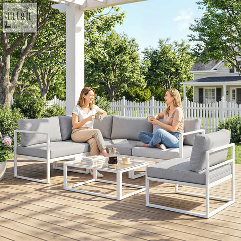 Modern outdoor garden sofa set with white aluminium frame and light grey cushions 65w x 65d for patio use