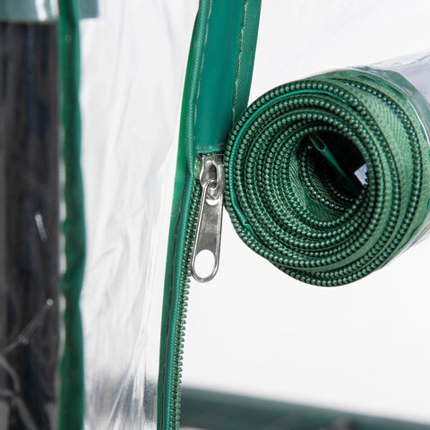 Green fabric zipper with silver metal pull tab on outsunny 5 tier mini greenhouse roll-up door plastic cover