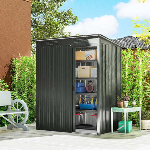 Black corrugated metal outdoor shed with sliding door and interior shelving made of galvanised steel for garden storage shed