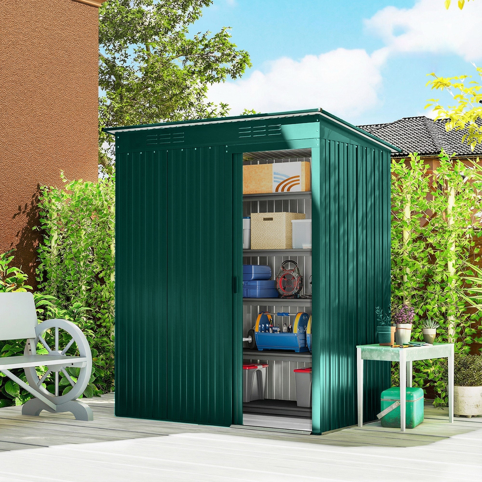 Green galvanised steel outdoor shed with sliding door and shelving inside perfect garden storage shed