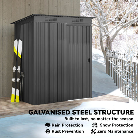 Dark gray galvanized steel garden storage shed with vertical panels and slanted roof for outdoor use