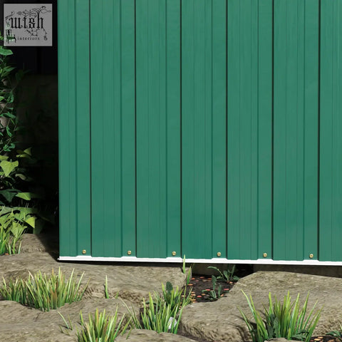 Green vertical metal siding of outsunny 5x3ft garden storage shed with sliding door made of galvanised steel