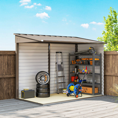 Gray metal garden shed with slanted roof and foundation kit showing open front with shelves and tools inside