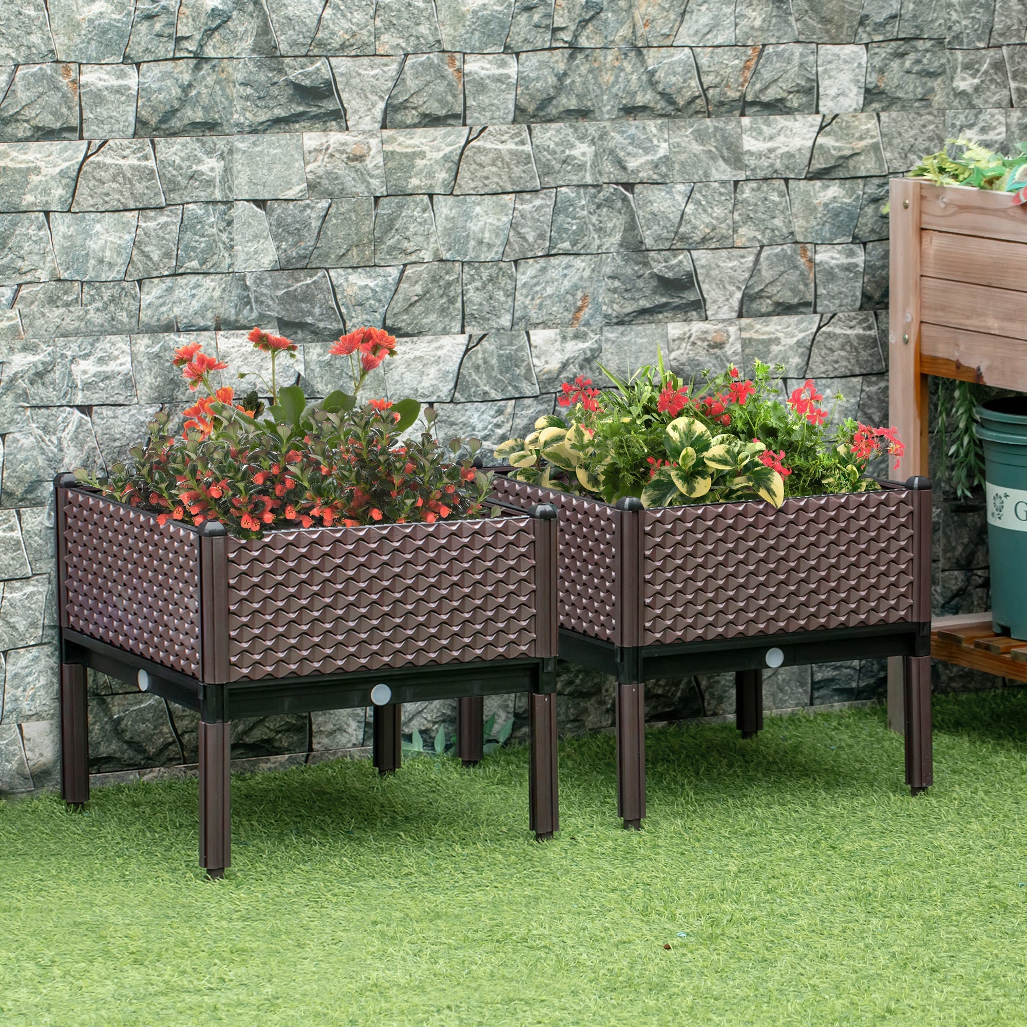 Outsunny brown woven plastic planter box with black metal legs and water drainage for growing vibrant plants