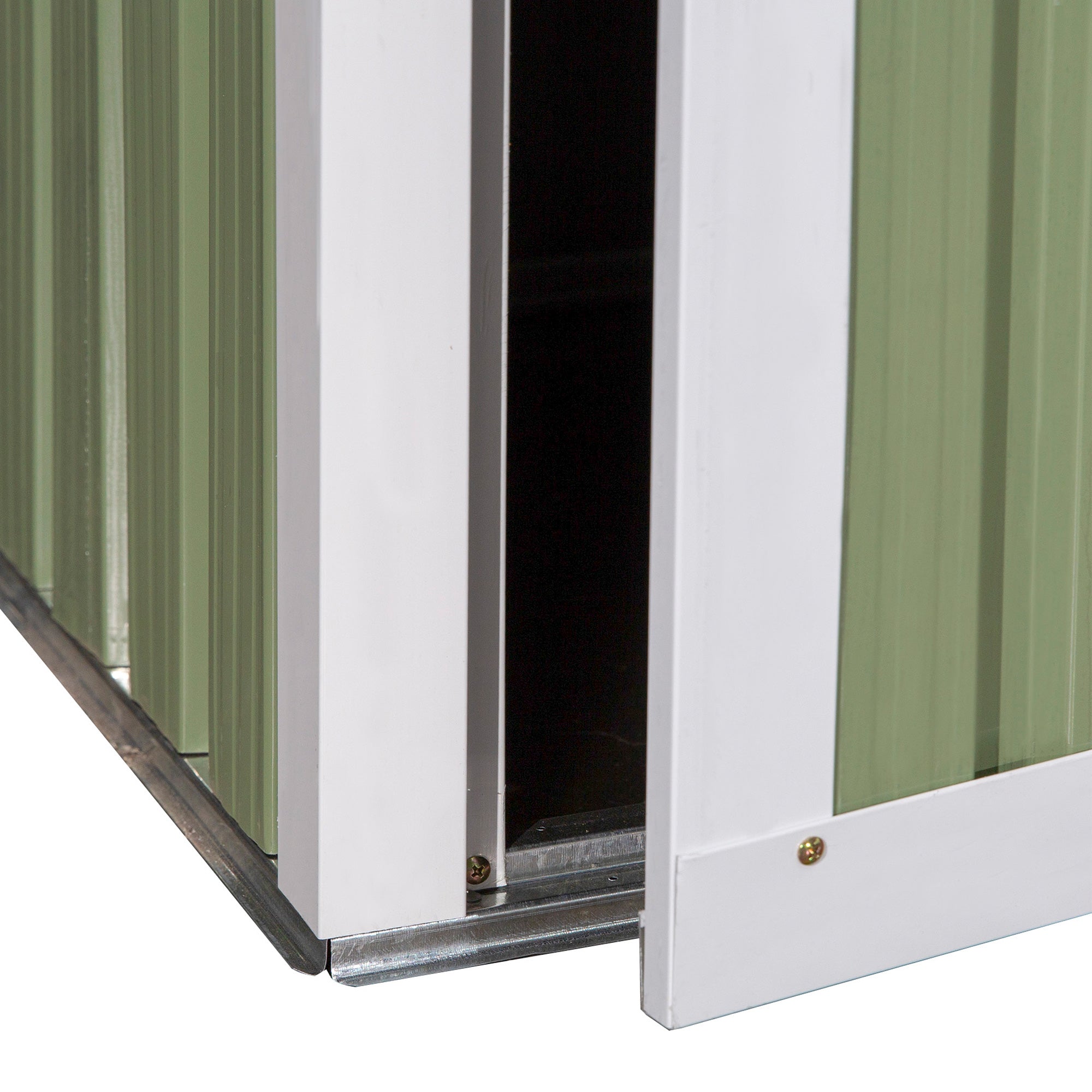 A white metal garden storage shed door with green corrugated panel silver trim and sloped roof design