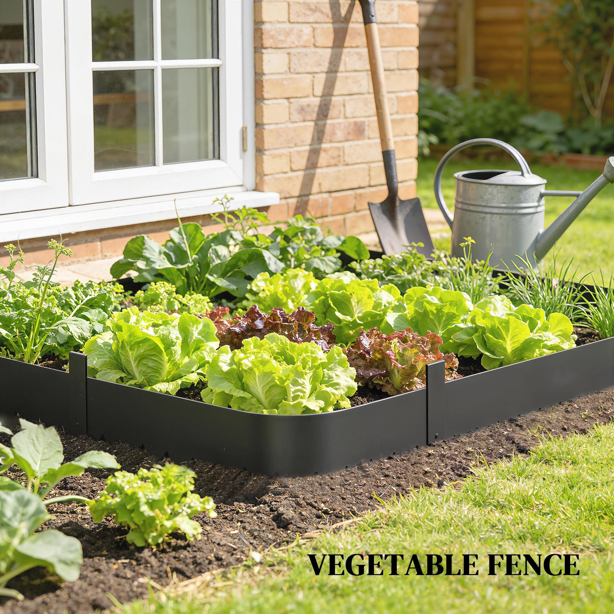 Black rectangular vegetable garden bed with raised edges and soil using outsunny flexible metal garden fence keeping mulch in place