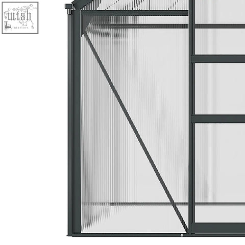 Black-framed outsunny 6x6ft greenhouse with transparent ribbed panels, aluminium frame, and four ground stakes included