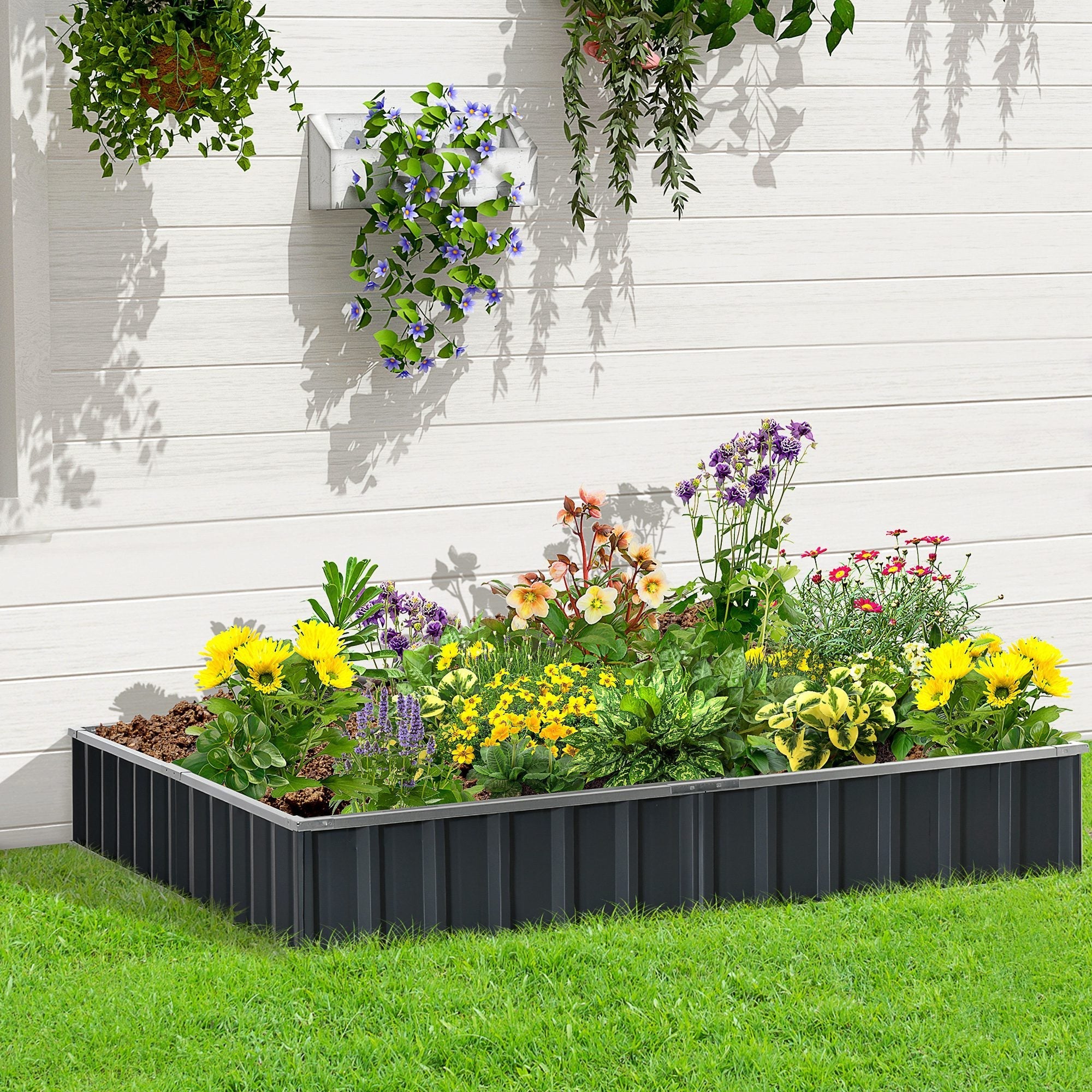 Black corrugated plastic Outsunny metal planter box garden bed filled with colorful flowers and greenery for starting growing