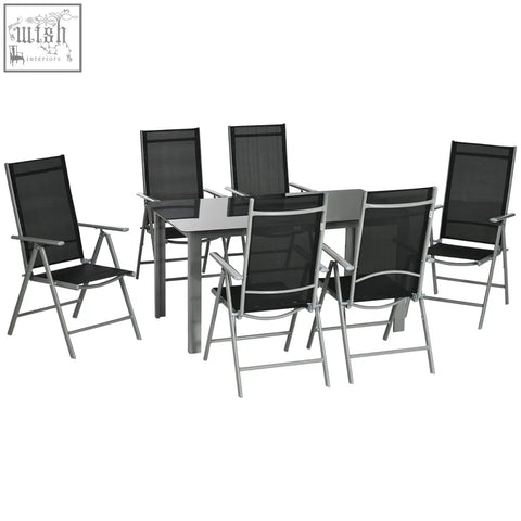 Black mesh garden dining set with silver aluminum frame, tempered glass table, and 6 folding reclining chairs outdoors