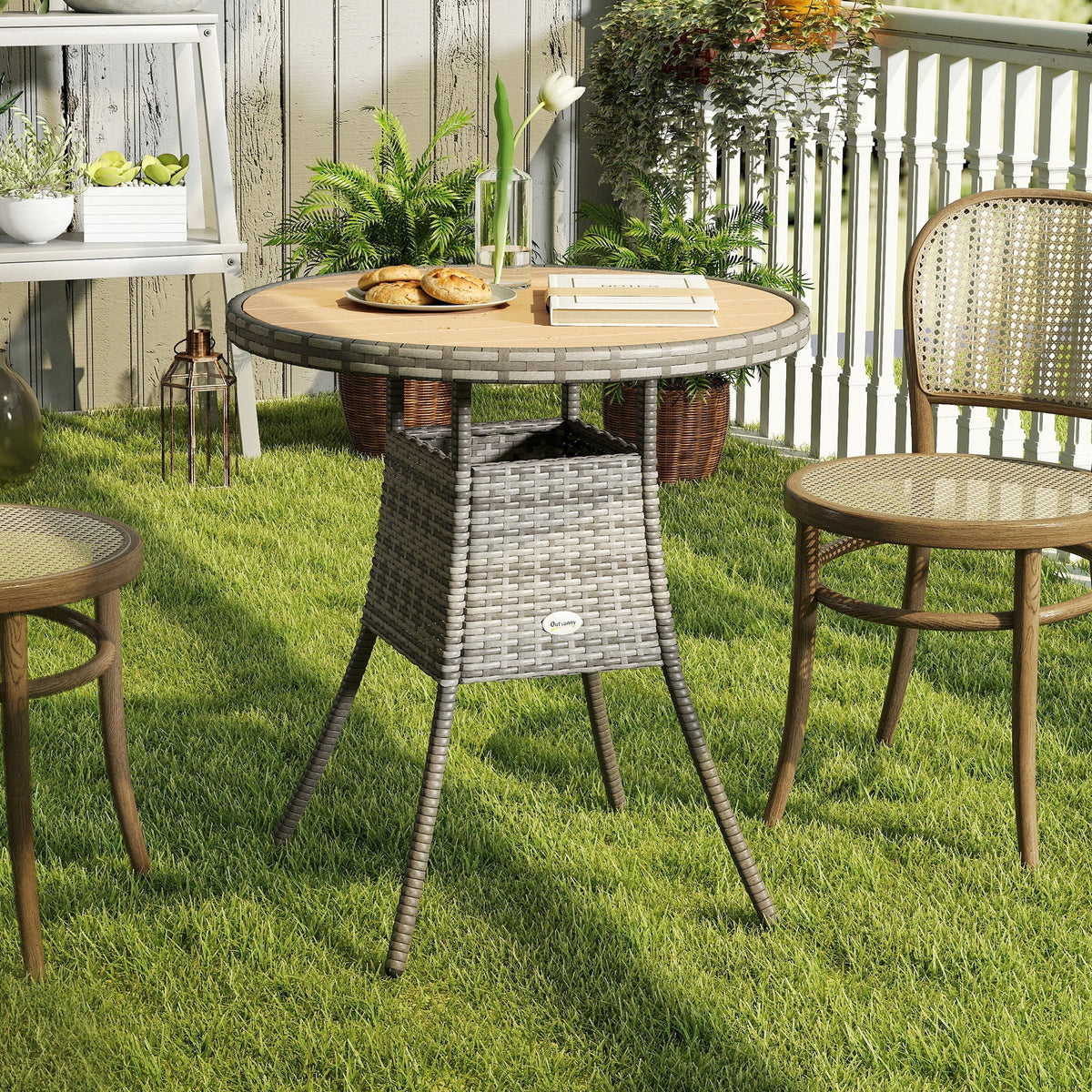 Outsunny gray woven rattan dining table with round wooden top and galvanised steel frame featuring storage basket