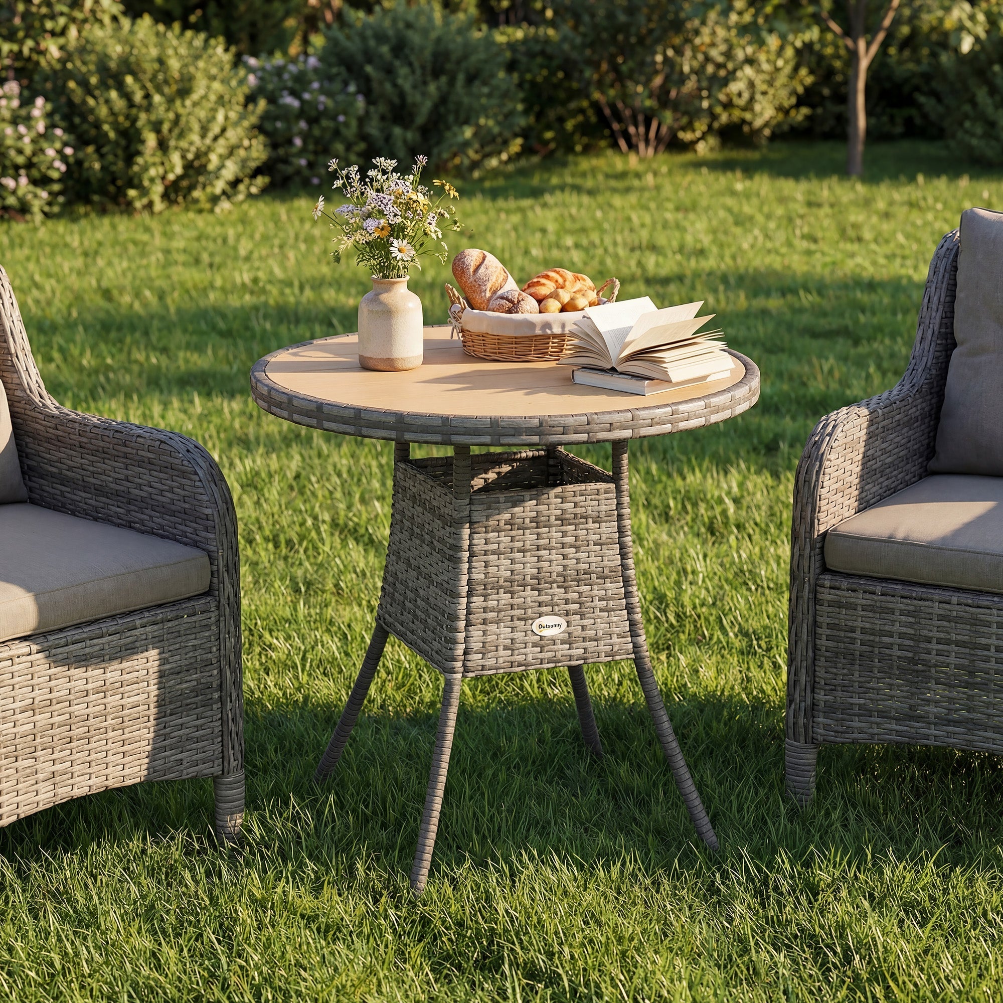 Gray wicker rattan dining table with round natural wood top and storage basket by Outsunny for outdoor use