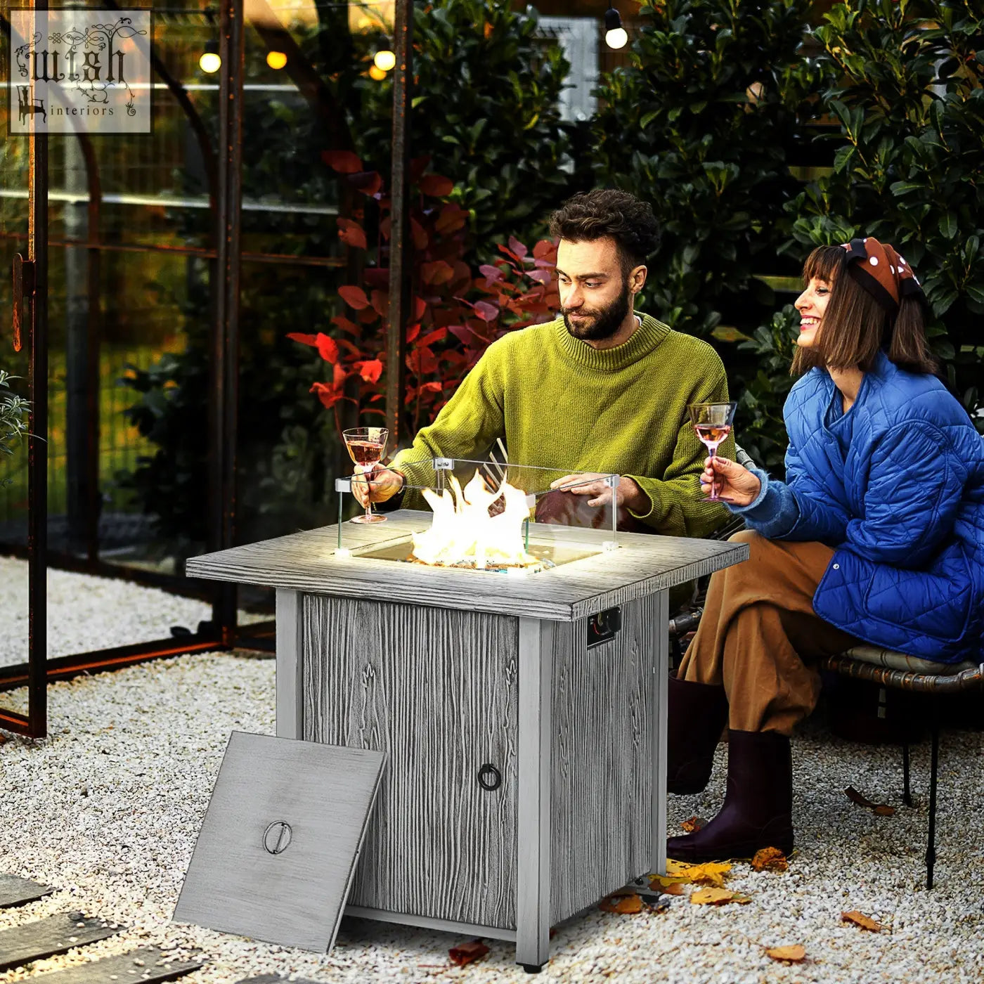 Outsunny grey wood-grain gas pit table with glass screen and glass beads showing visible flame and cover