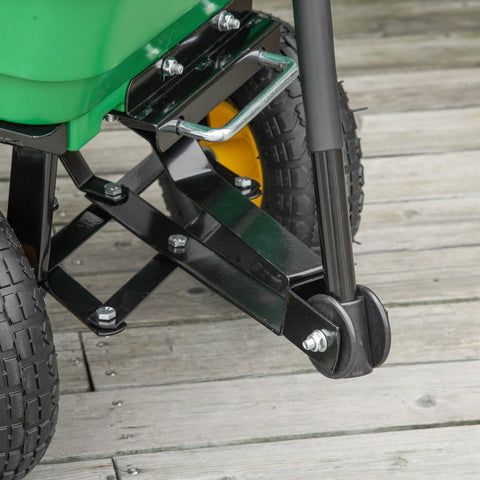 Green plastic hopper garden cart with black metal frame yellow wheels and silver handlebars for heavy duty use
