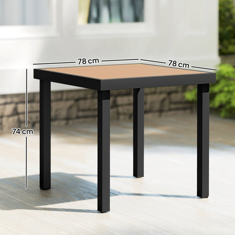 Outsunny 78 cm black metal garden dining table with light brown composite wood top for outdoor dining use