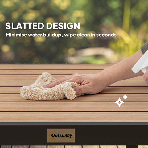 Beige microfiber cloth wiping a natural wood finish slatted surface of outsunny garden dining table with aluminium legs