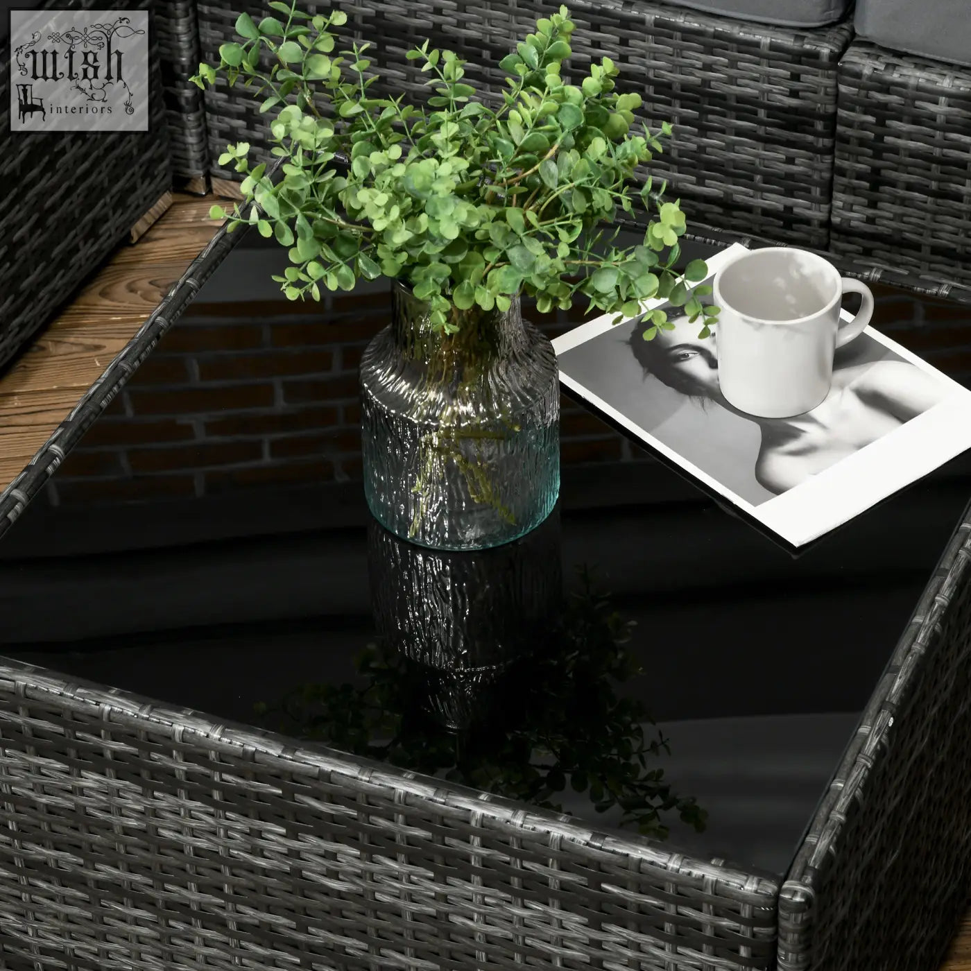 Outsunny 8 pieces patio rattan sofa set with steel frame features a textured glass vase 73d x 65hcm holding eucalyptus