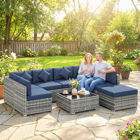 Gray woven wicker outdoor corner sofa set with navy cushions and steel frame perfect for garden seating