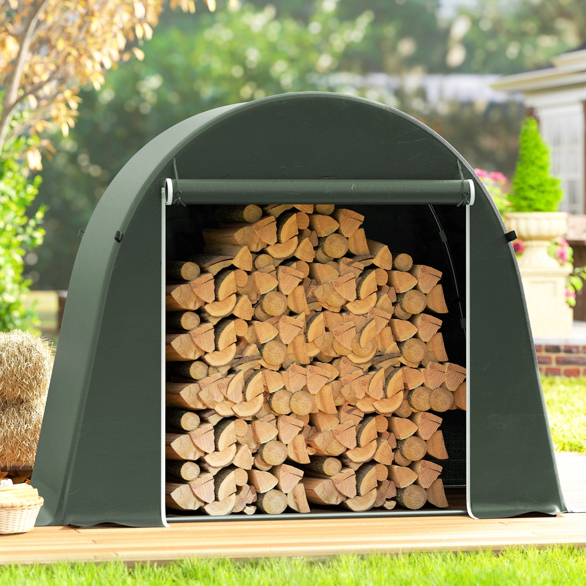 Dark green outsunny garden storage tent with roll-up door filled with firewood and galvanised metal frame
