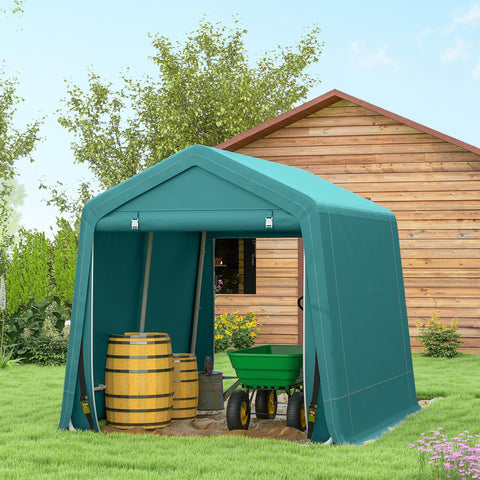 Teal green outdoorsy garden storage shed with double roll-up doors showing barrels and wheelbarrow inside