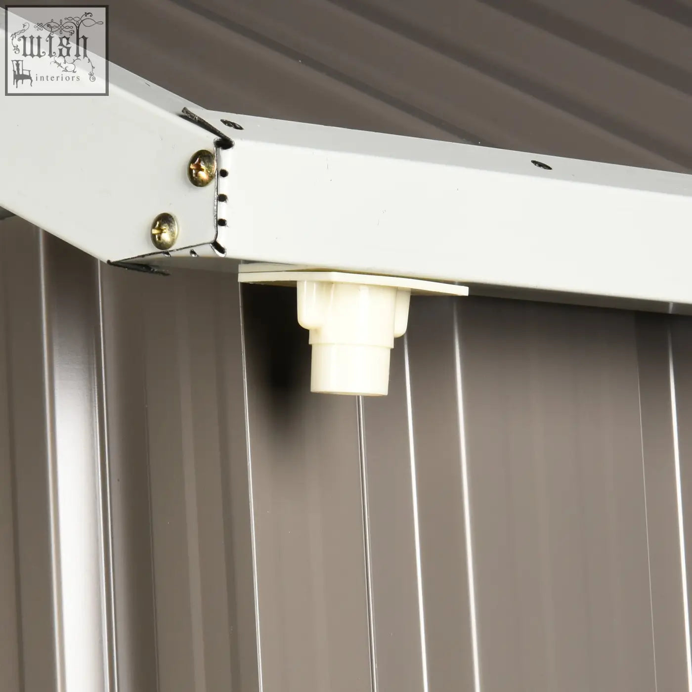 White plastic drain spout attached to grey galvanised metal garden shed frame with two doors and air vents