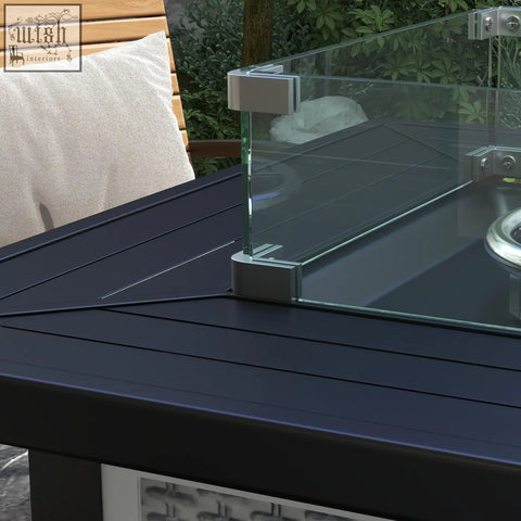 Black outdoor pit table with clear glass top silver metal frame and 50000 btu burner for propane tank use