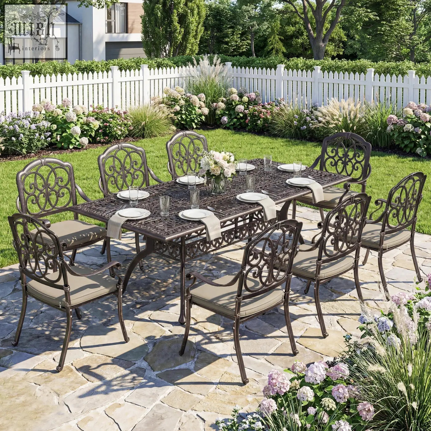 Brown cast aluminium garden dining set with ornate scrollwork beige cushions and parasol hole for patio use