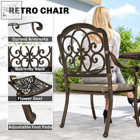 Bronze finished cast aluminium patio chair with ornate butterfly back and flower patterned seat from garden dining set