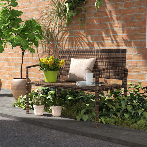 Brown wicker garden bench with cushioned seat and armrests made of poly rattan ideal for outdoor use assembly required