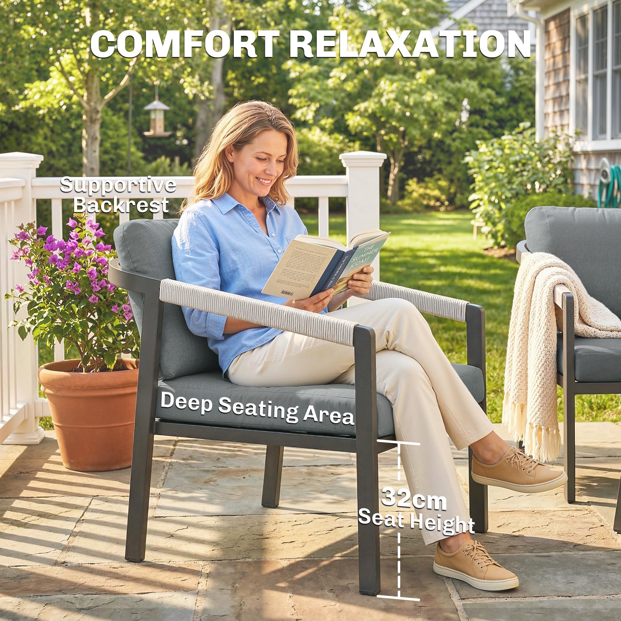 Gray outdoor armchair with supportive backrest and rope wrapped black aluminium frame arms for patio furniture 73d x 69h