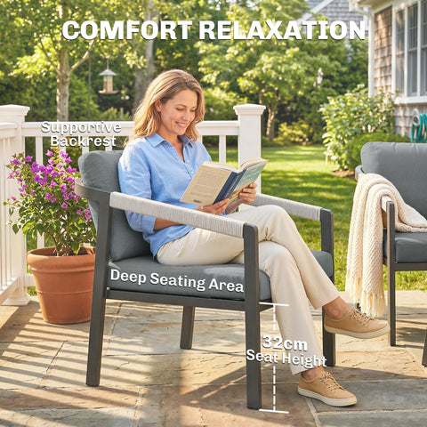 Gray outdoor armchair with supportive backrest and rope wrapped black aluminium frame arms for patio furniture 73d x 69h