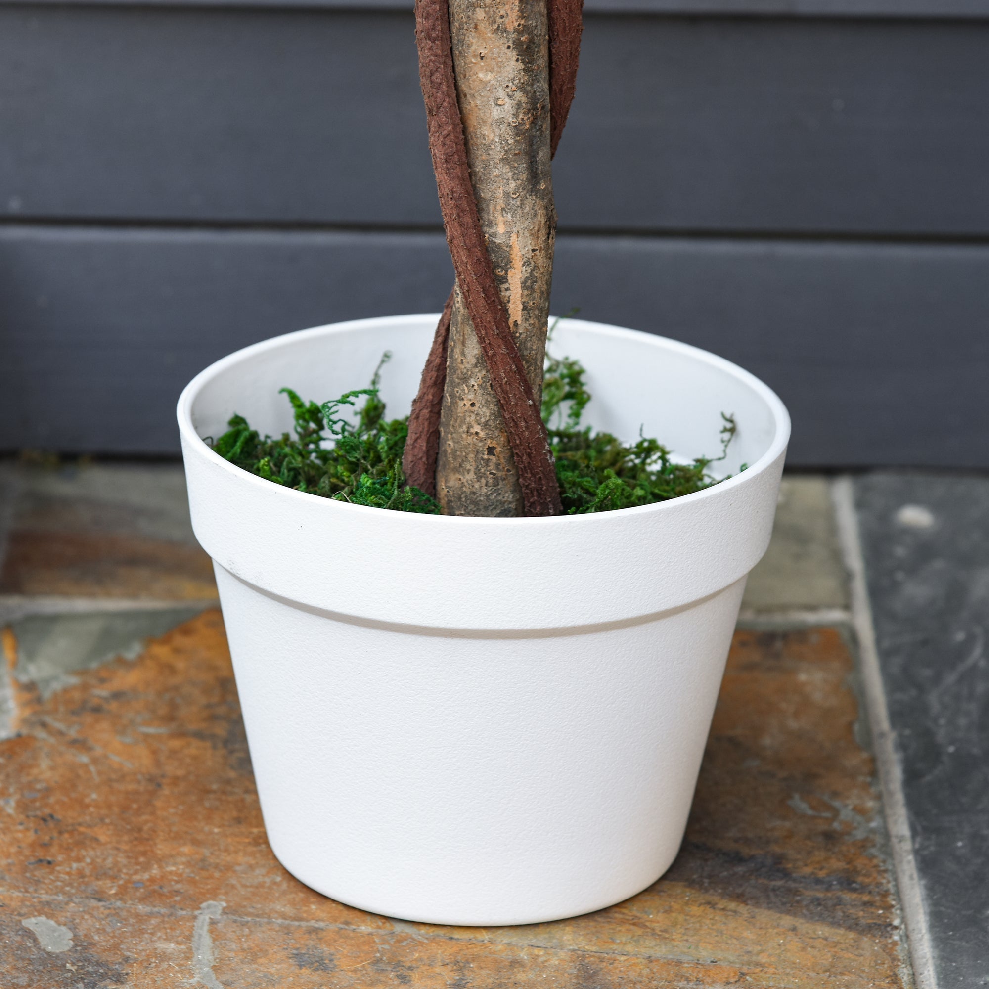 White ceramic pot with outsunny artificial tree featuring twisted brown trunk and green moss in cement soil