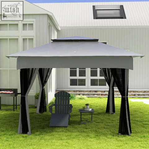 Gray two-tiered gazebo with black curtains and dark gray roof shown behind stainless steel body outsunny rotisserie grill