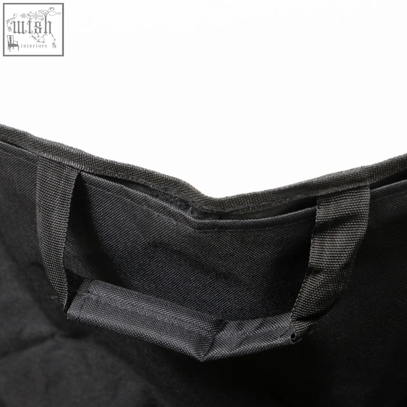 Black fabric handle with reinforced stitching on the outsunny camping chair steel frame and fabric seat for easy carrying