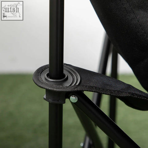Black fabric strap with plastic buckle securing the steel frame of outsunny camping chair with fabric seat