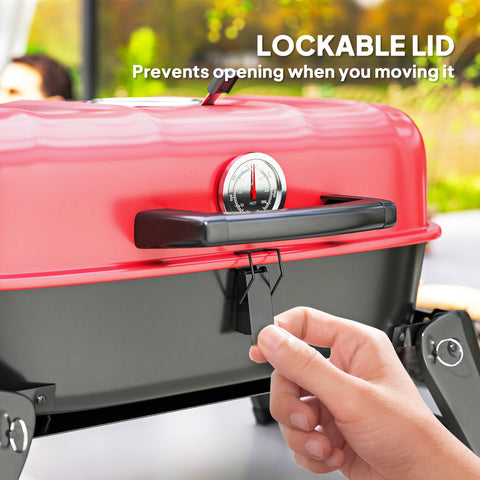 Outsunny red and black portable charcoal barbecue grill with lockable lid, temperature gauge, and grill grate for camping