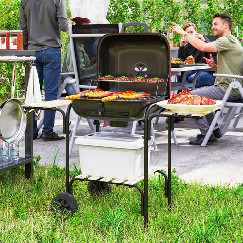 Black portable charcoal grill by Outsunny with grill grate, warming rack, wheels, and side shelves for outdoor BBQ fun