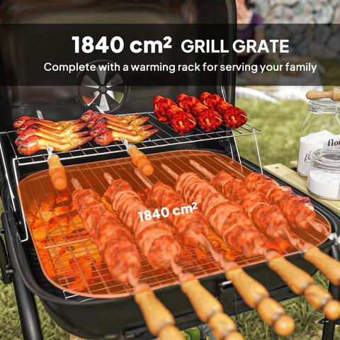 Red Outsunny portable bbq with 1840 cm² copper-colored grill grate and wooden-handled skewers cooking on warming rack