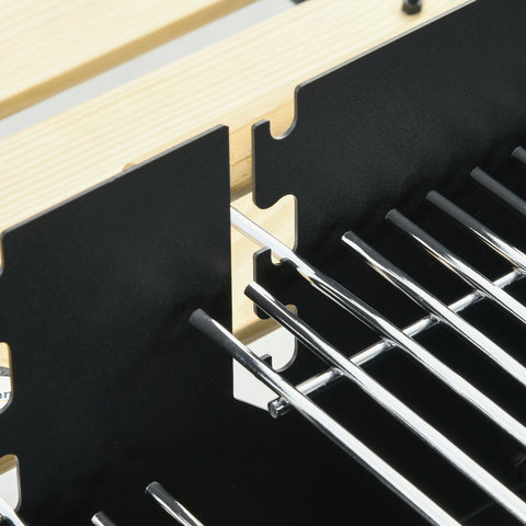Black metal tool rack with wooden base holding shiny chrome screwdrivers for adjusting grill height on Outsunny BBQ trolley