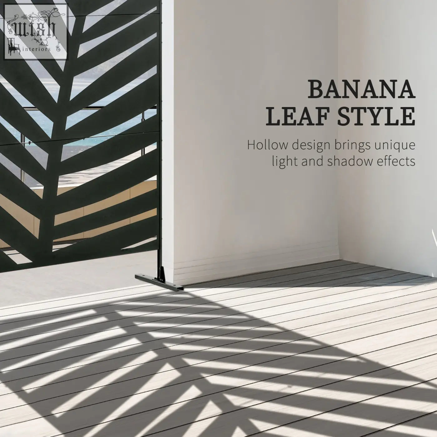 Black metal banana leaf privacy screen with hollow design casting geometric shadows and expansion screws on floor